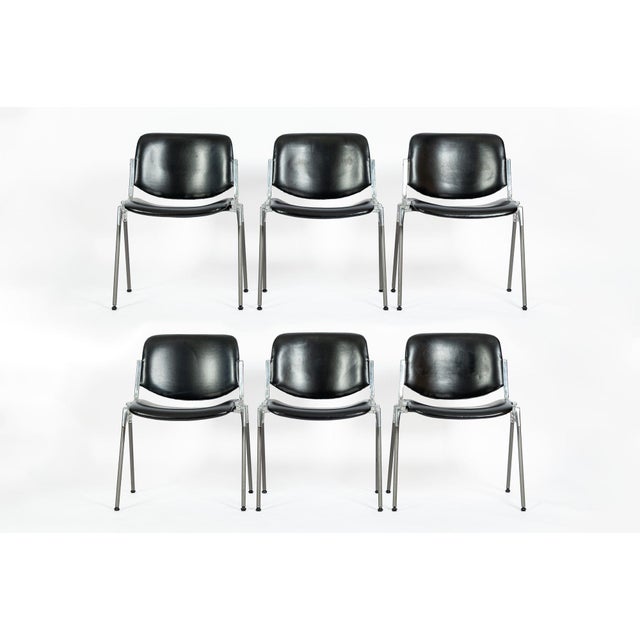 This set of six vintage Italian mid-century modern DSC 106 stacking chairs was designed by Giancarlo Piretti for Anonima...
