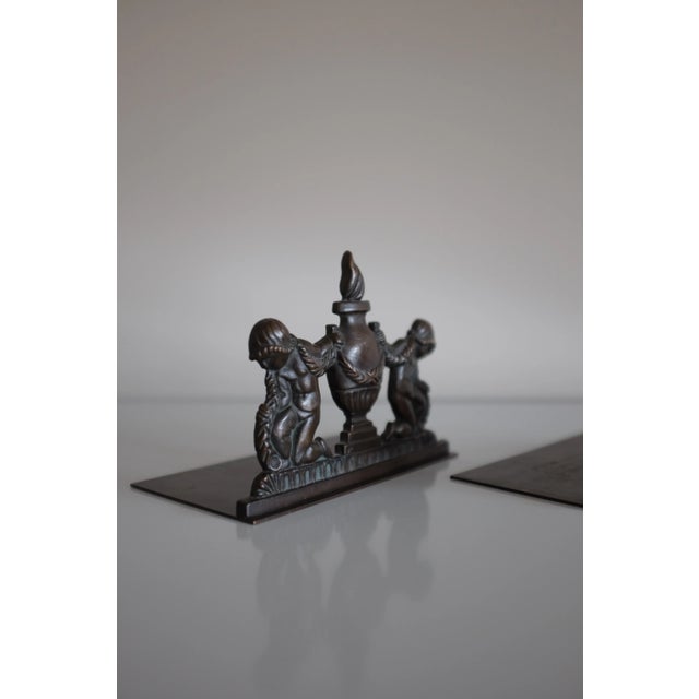 Rare and early pair of bronze bookends by Ystad Metall, likely from 1928 and designed by Oscar Antonsson. Decorative...