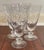 A charming set of four vintage Duncan & Miller crystal iced tea goblets in the classic Willow pattern, featuring delicate...