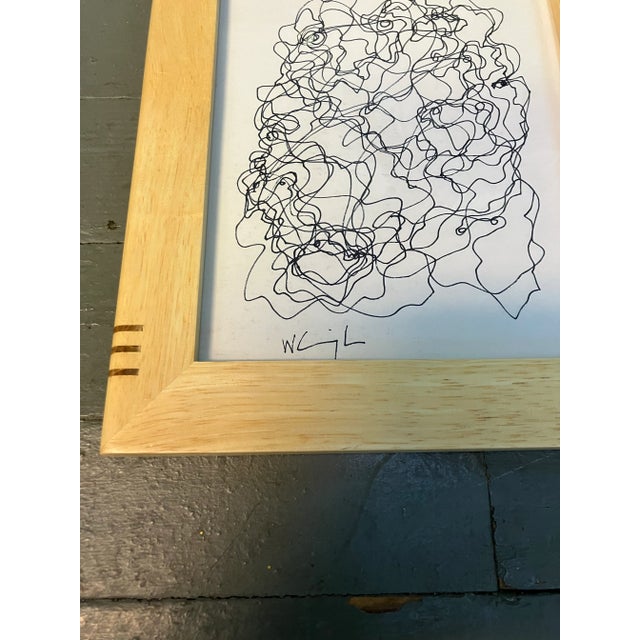 Contemporary original abstract pen and ink drawing by Wayne Cunningham. Signed and framed in a tabletop frame. Measures...