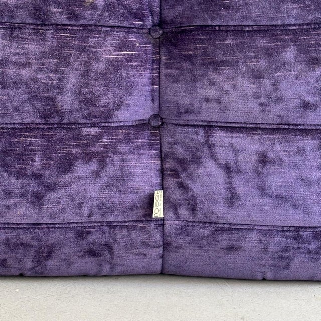 Lounge chair by Michel Ducaroy for Ligne Roset. Vintage, purple, in very good condition. The foam is still firm, and the...