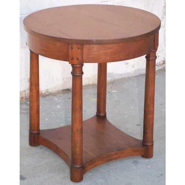 This round table with turned legs and shelf is made of distressed walnut. Looks completely authentic. Because each table...