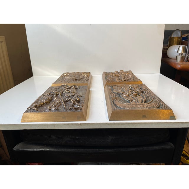 A set of 4 artist wall plaques - reliefs executed in cast bronze in a limited series by Anders Nyborg in Denmark during...