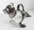 We are selling this great Victorian Silverplate wine decanter. This decanter has great novelty form of a Walrus or Seal....