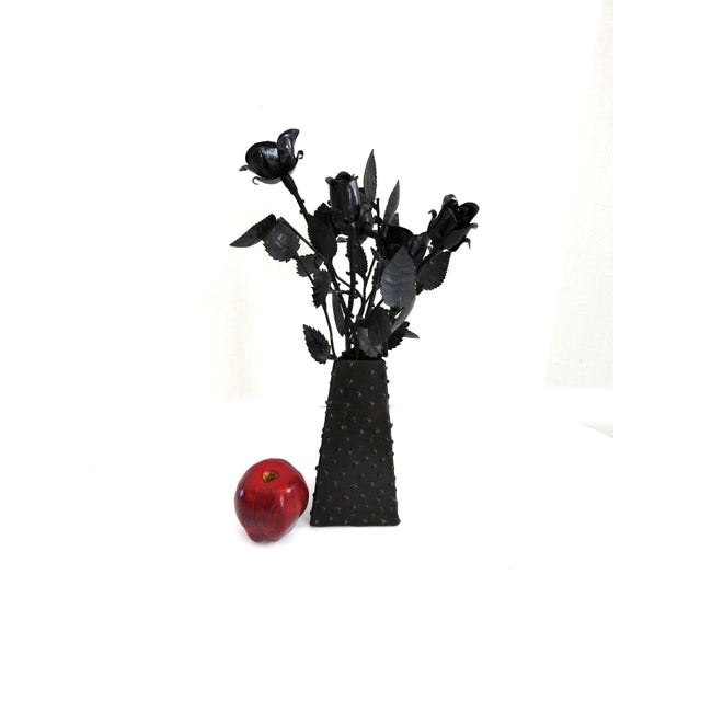 One-of-a-kind sculptural arrangement, masterfully forged by hand. A dramatic bouquet of meticulously detailed wrought iron...