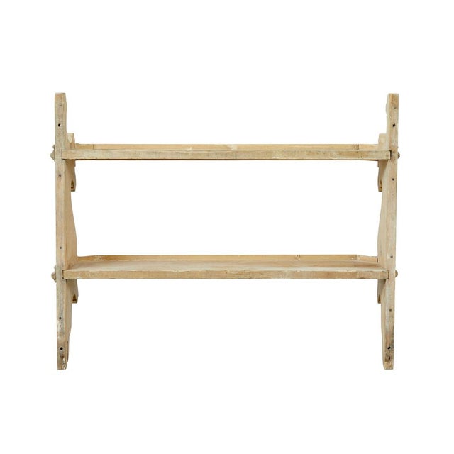 Mid 19th century scandinavian pine wall shelves circa 1860. We are pleased to offer these original and rare wall mounted...