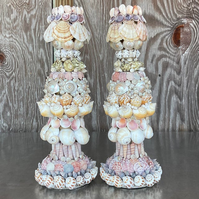 Illuminate with seaside charm using our Vintage Coastal Shell Encrusted Candlesticks - A Pair. These elegant candlesticks...