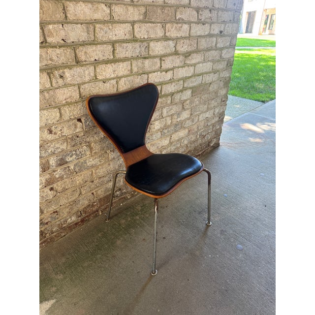 Leather, wood and chrome sculptural side chair in the style of Fritz Hanson by Arne Jacobson's iconic "Series 7" chair....