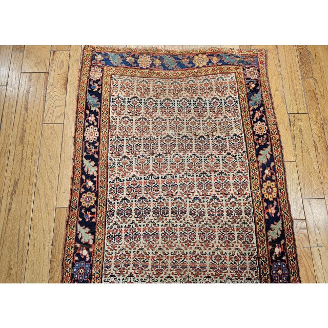 "An exceptional 19th century Persian Bidjar wide runner, handwoven in the late 1800s, featuring an extraordinarily rare...