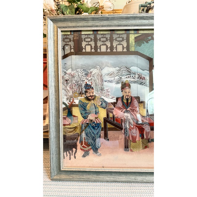 An exceptionally detailed early-to-mid-20th-century Chinese reverse-glass painting depicting the traditional story of the...