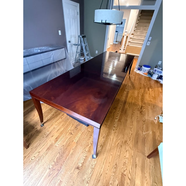 Decca Home Rosenau Parsons Dining Table The Rosenau Parsons Dining Table is a luxury extendable table designed by Michael...