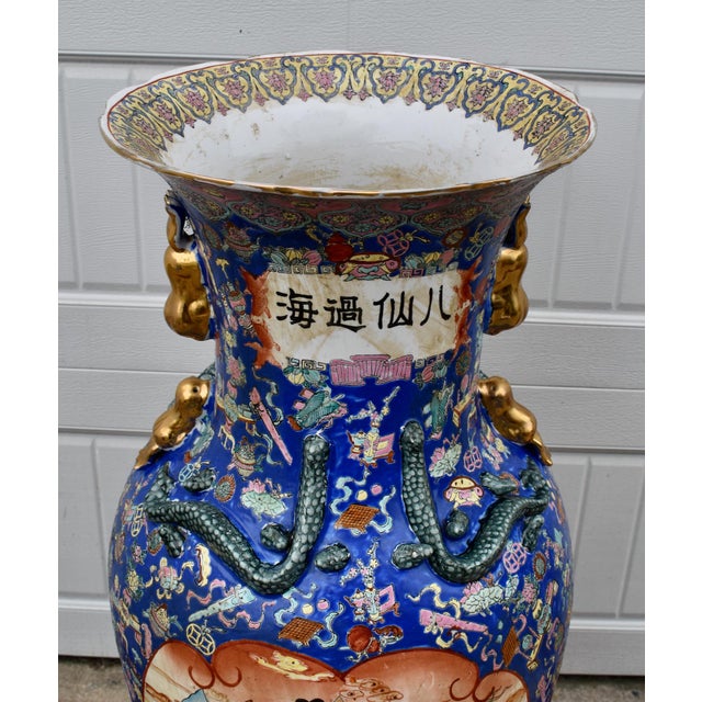 Vintage (1970's) Floor Vase with Rosewood Stand is Chinese. Origin is China. Very Heavy. Painted Scenes with Dragons. Made...