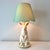 Vintage custom built ceramic hand painted bunny rabbit lamp paired with a green scalloped empire lamp shade.