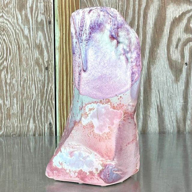 A fantastic vintage Boho pottery vase. Made by the iconic Tony Evans and signed on the bottom. Beautiful Raku fired finish...