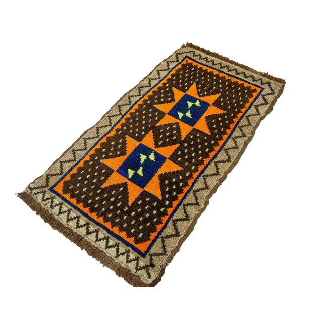 Vintage Handknotted decorative mini rug from Kars region of Turkey. Approximately 45-55 years old. In very good condition.
