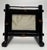 A self supported stand holds this Asian inspired faux bamboo tabletop picture frame. The frame consists of wood embossed...