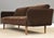 A mid century modern brown mohair sofa professionally reupholstered. Walnut color legs, very well made. Circa 1950’s. Made...