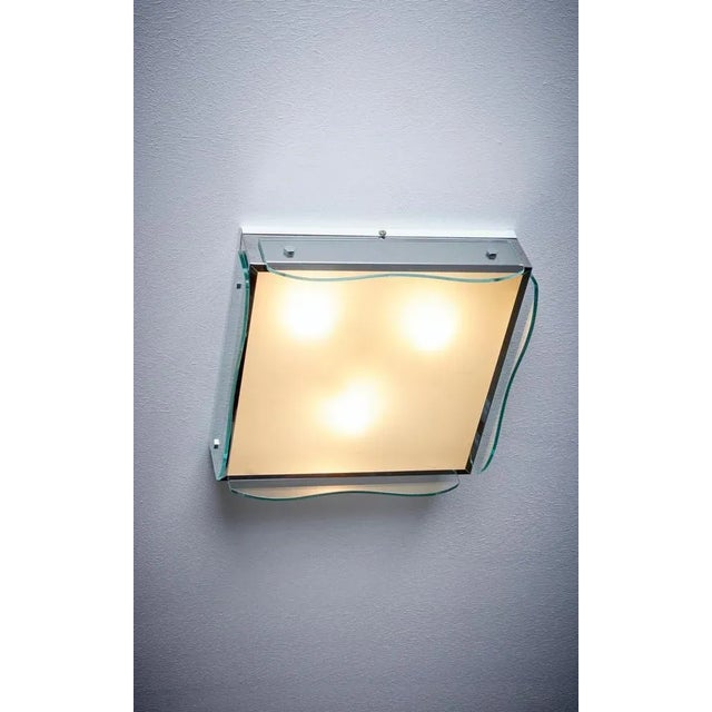 1960s Design Italian Wall Lamp nos in clear glass. Up to 250V (Europe/UK Standard).The wiring of this item may be original...