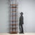 1960s floor-to-ceiling bookcase with a versatile and functional design. Made of mahogany veneer wood, it offers...
