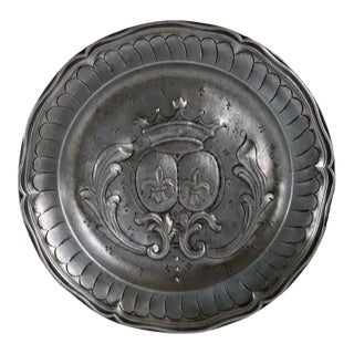 French Pewter Chased and Repousse Armorial Wavy Edge Reeded Plate For Sale