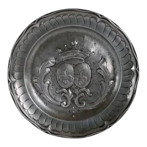 French Pewter Chased and Repousse Armorial Wavy Edge Reeded Plate