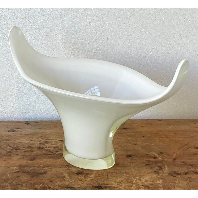 This sculptural art glass centerpiece showcases the ethereal beauty of Italian-inspired modernism. Featuring a graceful...