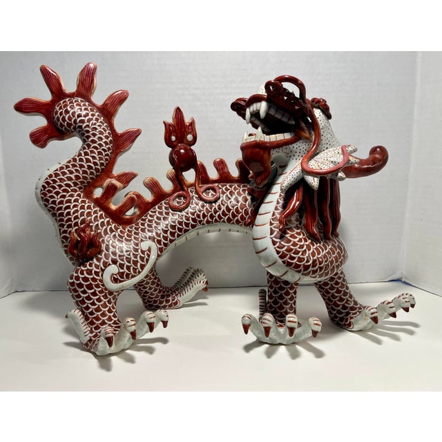 Stunning vintage Chinese porcelain dragon sculpture dating to approximately the 1950s. Expertly crafted and hand-decorated...