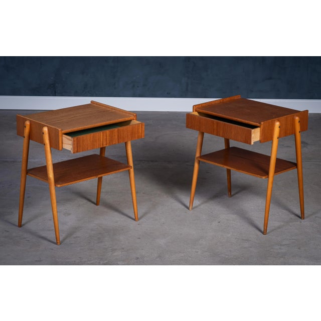 A timeless pair of Swedish teak nightstands crafted by AB Carlström & Co. Möbelfabrik in the early 1960s. These design...