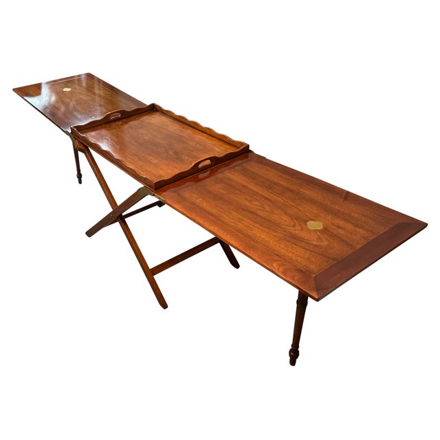 A fabulous serving piece for the skilled entertainer. This "Party Butler" by Baker can be expanded from a simple tray...