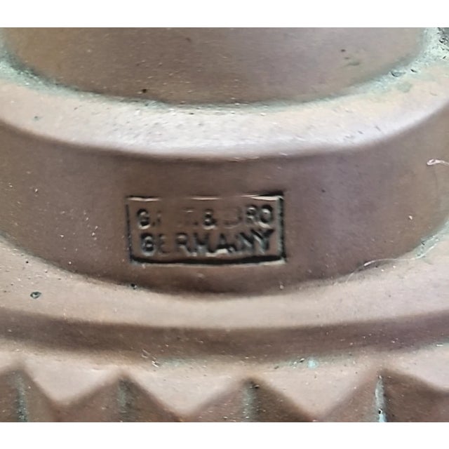 A superb antique German copper Turk’s Head / Kugelhopf mold, stamped “G.M.T. & BRO / GERMANY.” This finely crafted piece...