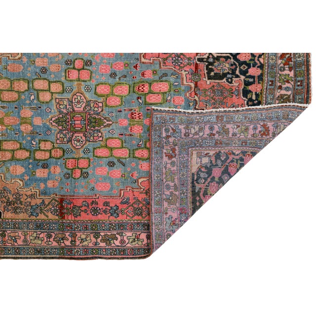 This exquisite antique Bidjar rug, dating back to the turn of the 20th century, showcases the legendary craftsmanship....
