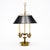 Bouillotte lamp from France in the French Empire style. This piece is made of finely cast bronze and features four...