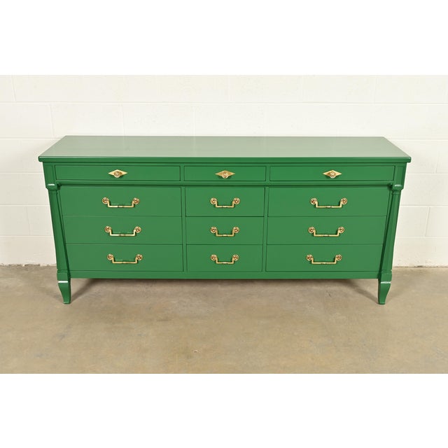 An exceptional French Regency Louis XVI style twelve-drawer triple dresser or credenza By John Widdicomb USA, Circa 1960s...