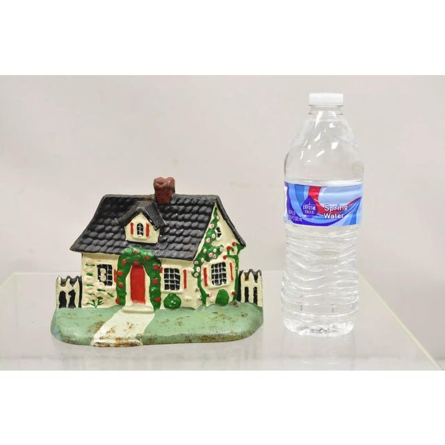 Antique Victorian Cast Iron Figural Traditional Cottage House Painted Door Stop. Circa Early 1900s. Measurements: 5" H x...