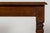 Late 19th century French Louis XVI style writing table crafted in oak, sourced in Provence, France. The table features a...