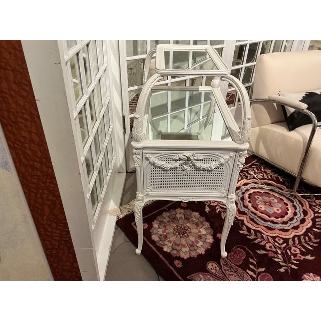 This item is a French Inspired mirrored bar cart or serving trolley. Three sides open or storage of libations. It is also...