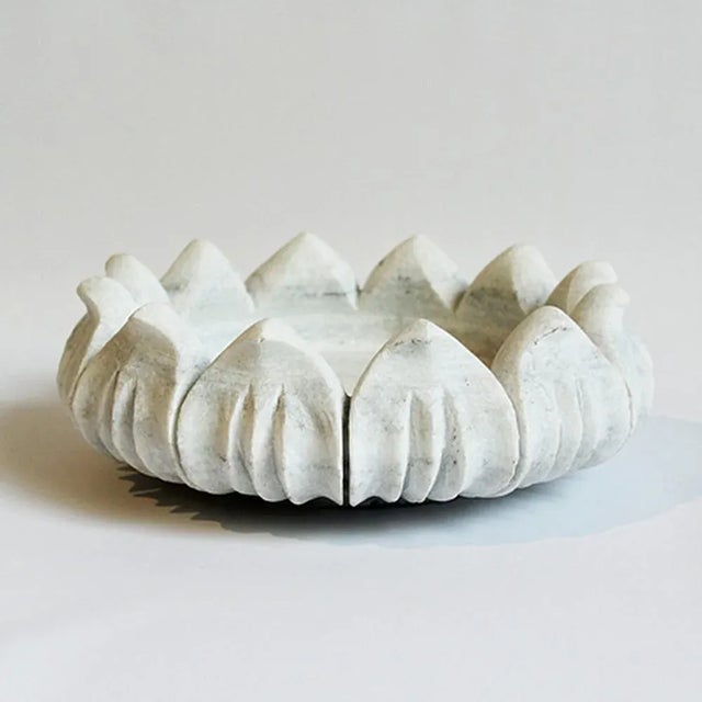 Hand carved white marble bowl made in India. Beautiful for indoor or outdoor use. Each varies slightly in natural marble...