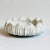 Hand carved white marble bowl made in India. Beautiful for indoor or outdoor use. Each varies slightly in natural marble...