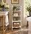 A charming late 19th-century American bamboo étagère retaining an old white painted finish, with four open shelves framed...