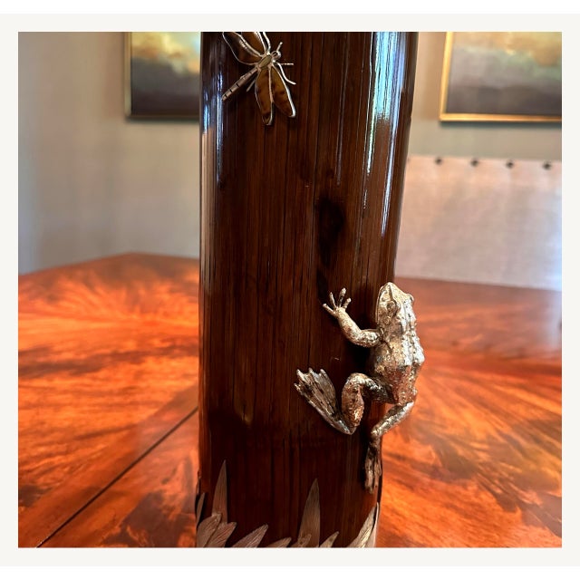 A rare complete set of four decorative bamboo cylinder vases, each mounted with highly detailed silver-plate figural...