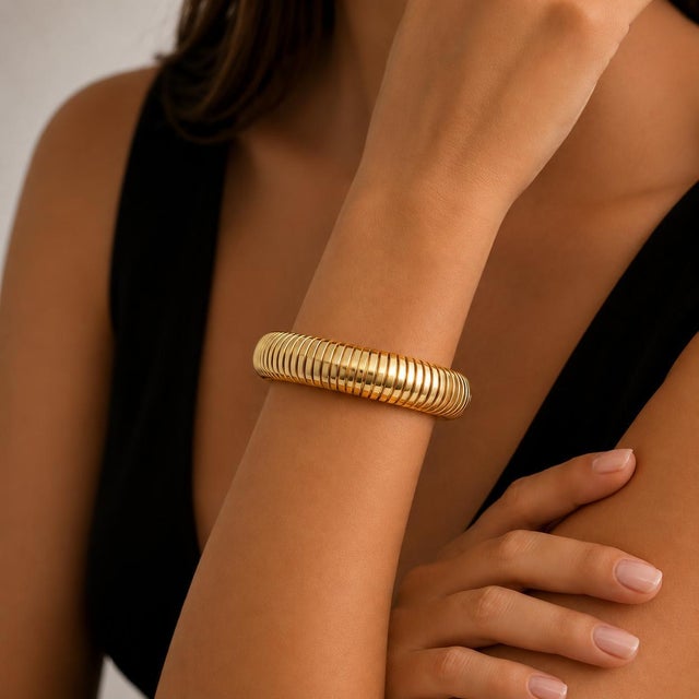 14k Yellow Gold Tubogas Flexible Bracelet, Italy, 7.5 in length, 14.0 mm width