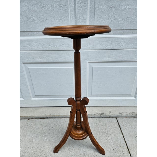 This Victorian style tripod-based plant stand is 32 inches in height, sturdy and ready for use. The interior diameter of...
