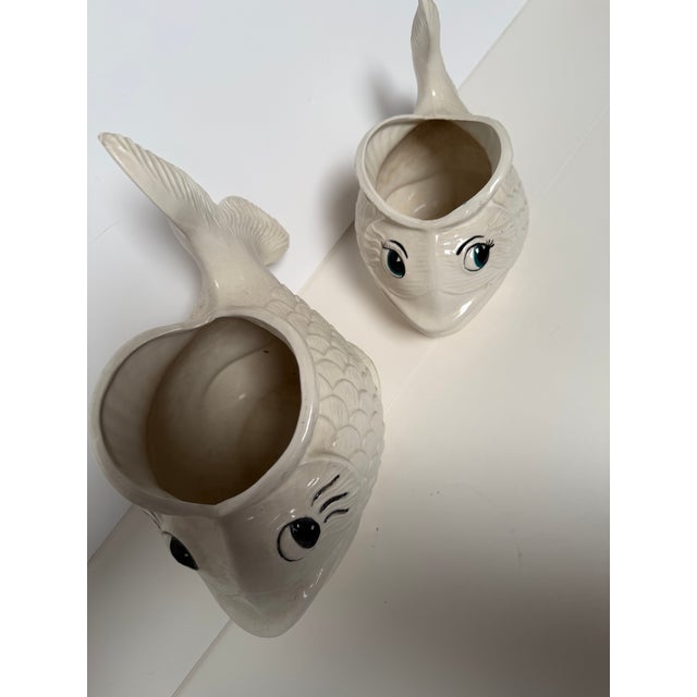 Pair of Mid-Century Modern Ceramic Fish Planters – Sculptural Coastal Decor Bring a playful dose of mid-century charm to...