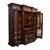 An impressive oversized Victorian secretary desk and bookcase crafted from walnut and burl wood, dating to approximately...