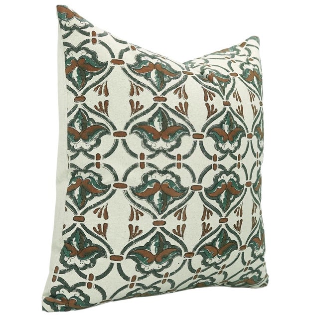 The Fabdivine Block Print Cushion Cover with the Hridyavan print brings a blend of green and brown hues to your space,...