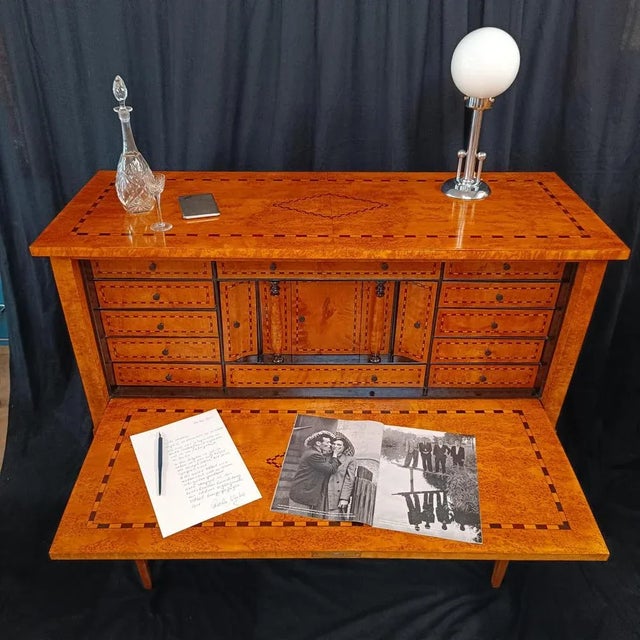 A secretary from 1880/1900, solid birch and veneered. richly decorated with inlays.