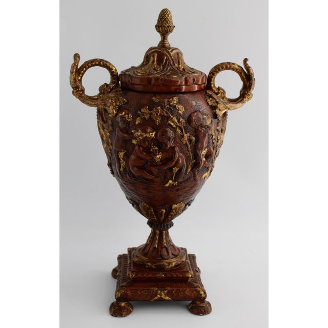 Maitland-Smith Neoclassical Urn Putti Cherub Bacchnalian 17" tall x 10.5” wide x 7” deep Known for their masterfully...