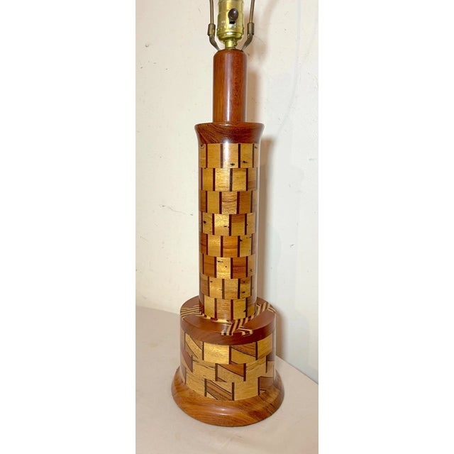 Crafted with an eye for detail, this modern electric table lamp by Wilk serves as a functional art piece for any space....