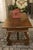 English 1930s Red Painted Metal Magazine Rack with Medallions and Greyhounds For Sale - Image 9 of 11