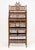 Aesthetic Movement Chinoiserie Bamboo and Elm Etagere, 19th century, with three drawers and shelves. 79.25" H x 31.75" W x...